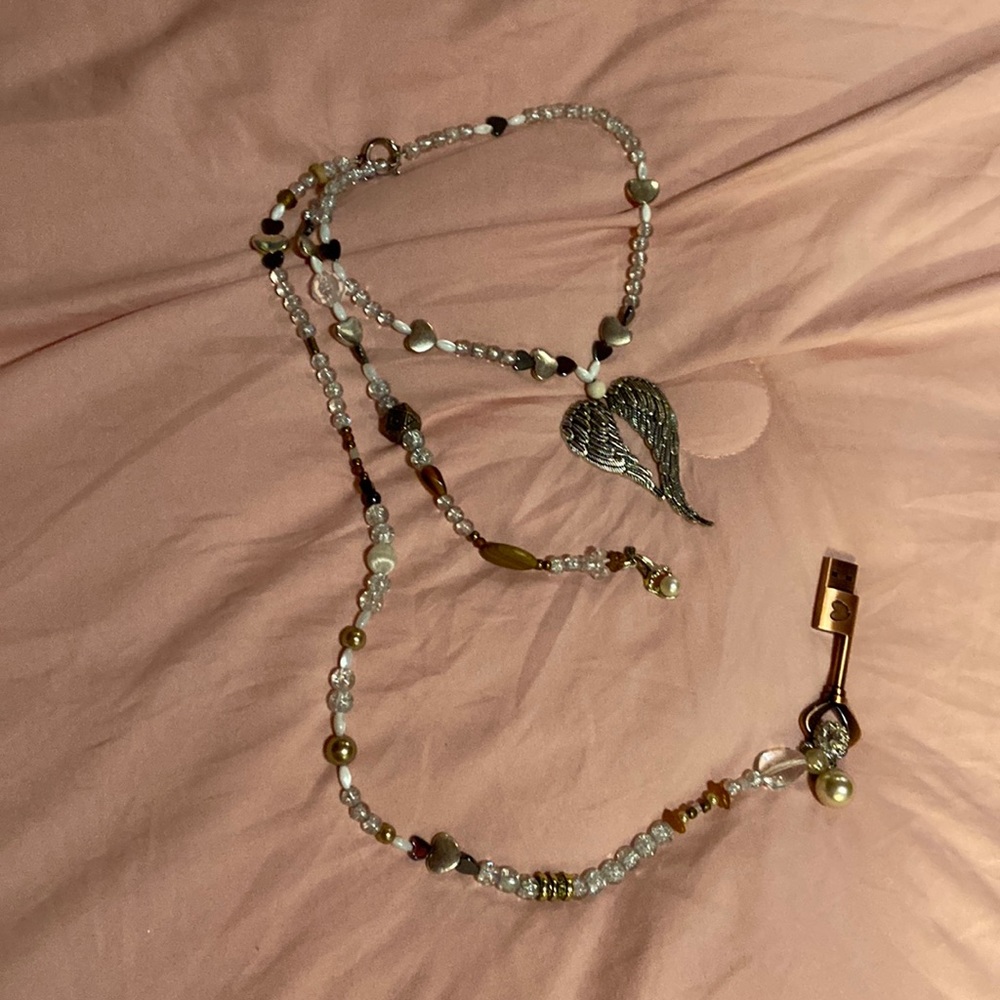 Hand beaded choker w two long strand to go down the front or back
